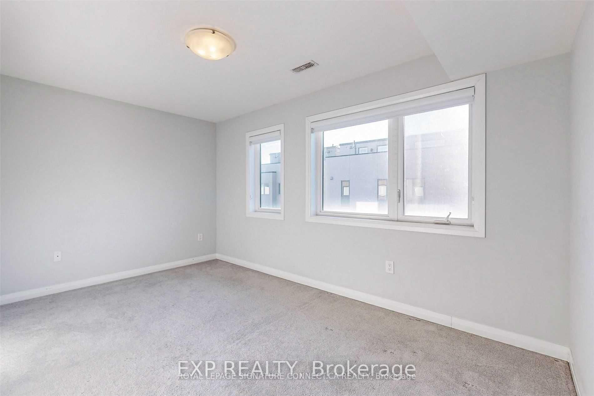 16 Caroline Carpenter Grove, Toronto, ON M3K 0B1 photo 2